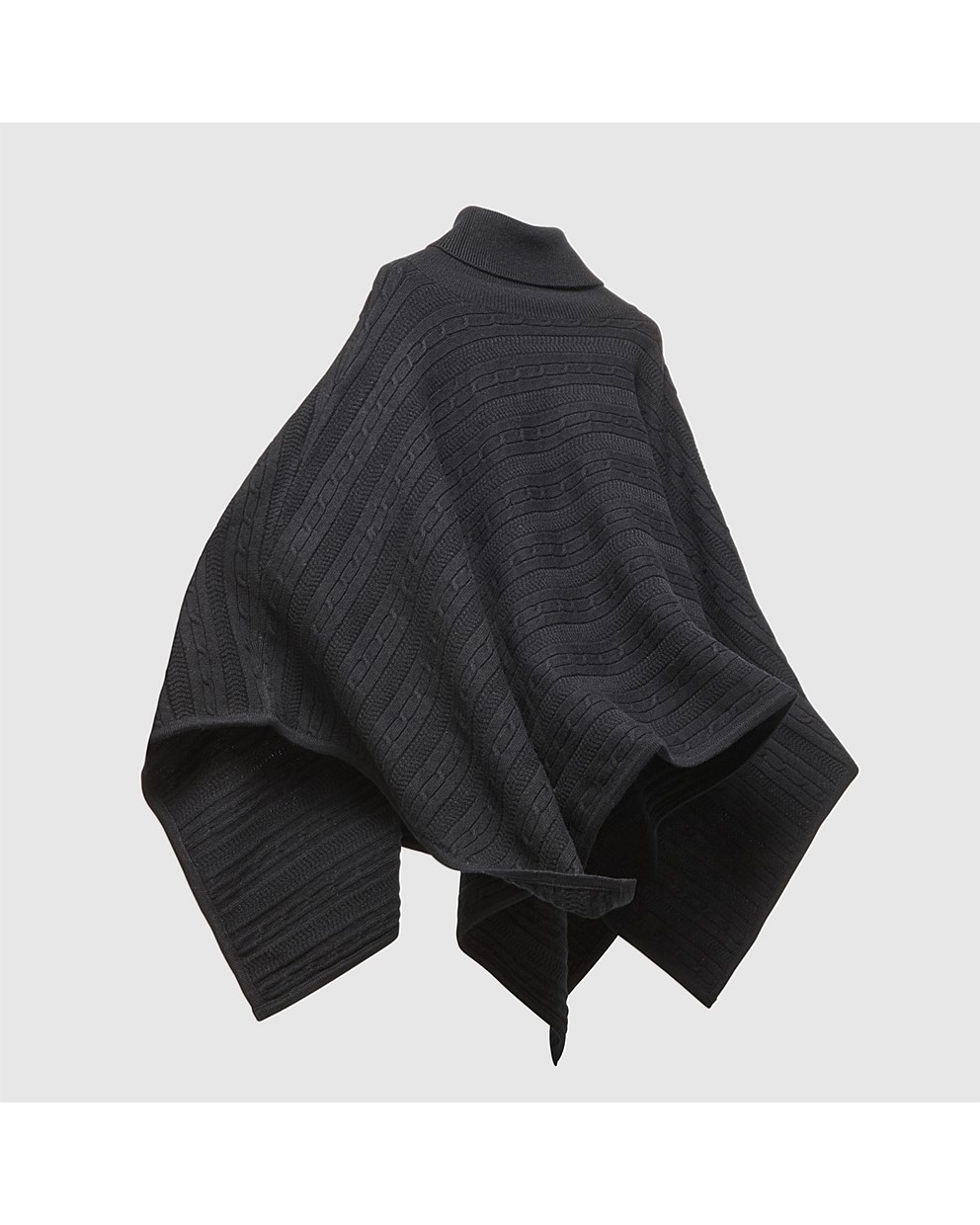 Assemble Knit Poncho