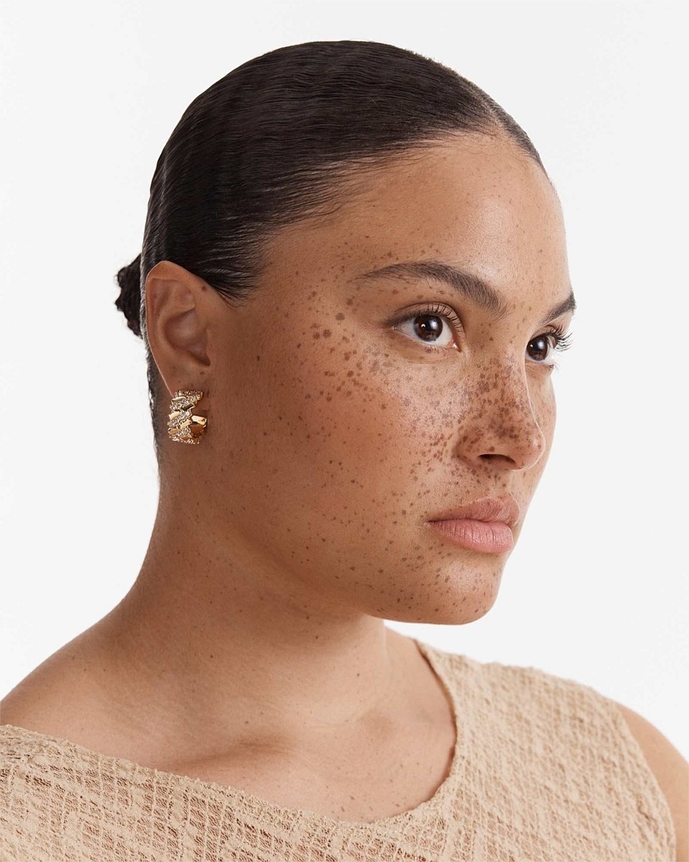 Winked Huggie Hoop Earrings